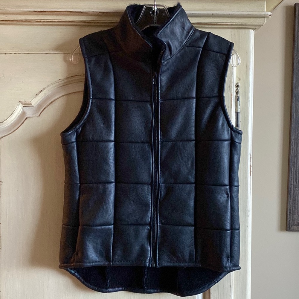 BONZ black lamb wool skin vest.